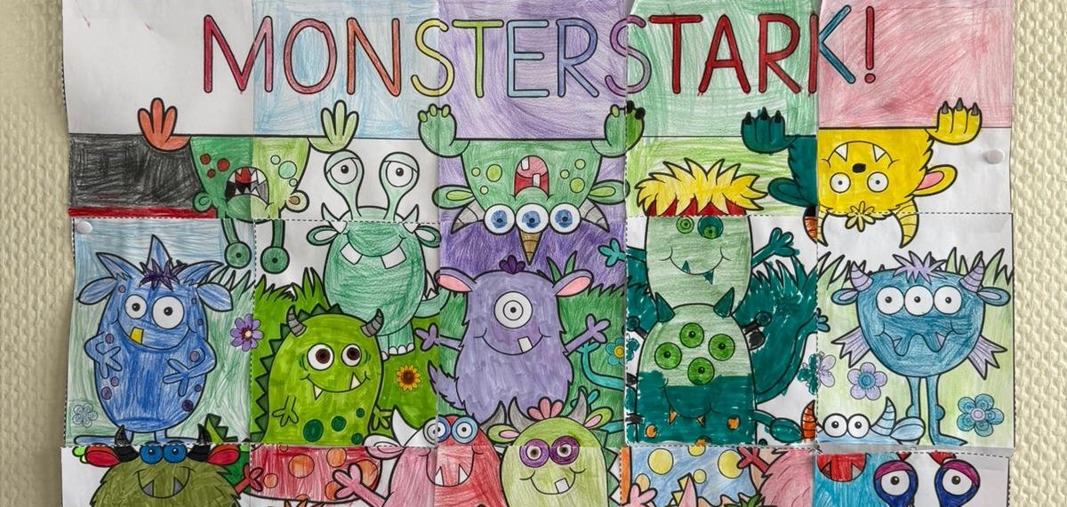 Buntes Bild mit Text "Zusammen sind wir MONSTERSTARK"